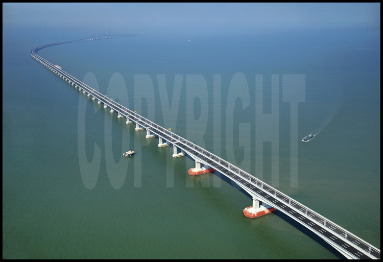 Donghai bridge between kilometric point 16 (main suspended bridge, where biggest vessels can get through from Hangzhou bay to Eastern China Sea) and 24 (elevation 4, for vessels under 1000 tons).