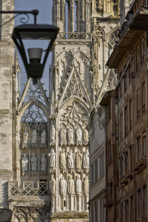 Rouen, city center : facade of cathedral Notre Dame from rue du Gros Horloge