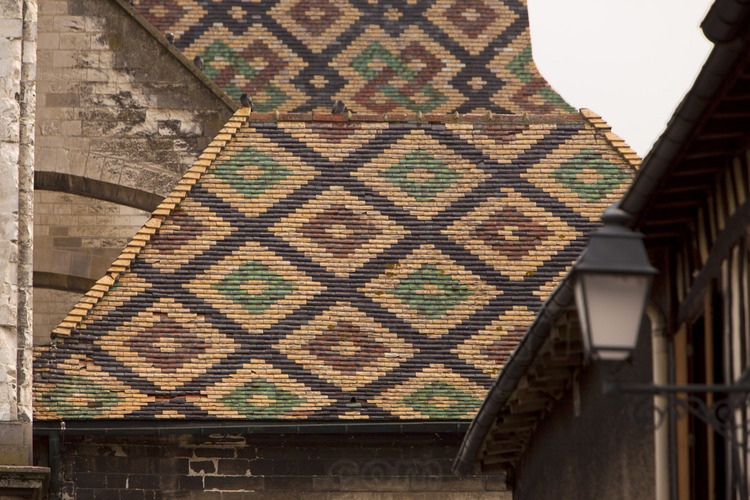 In the east of the historic city, detail of glazed roofs of Saint Nizier church. Elevation 20 meters.