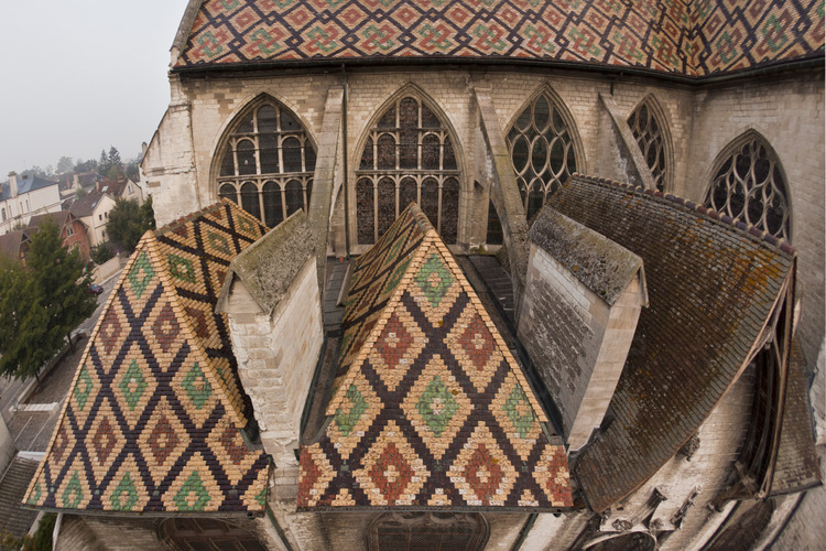 In the east of the historic city, detail of glazed roofs of Saint Nizier church. Elevation 20 meters.