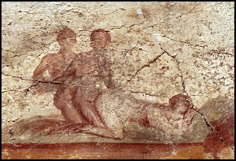 On one of the Porta Marina Suburban Baths dressing room walls, a painting depicts two men one behind the other, the first penetrating a young woman with light skin and a full backside.  This type of scene should not be shocking, as all types of sexual acts were commonly practiced.  The bath was a place to heal the body and to meet others.