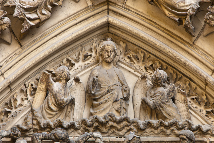 South facade, portal of Saint Etienne. The tympanum narrates the life of Stephen, which was dedicated to the first cathedral of the diocese of Paris, before the construction of Notre Dame. Here, detail depicting the Resurrection. Altitude 9 meters.