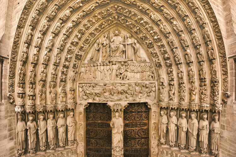 At the height of the portals of the west facade. At the center of facade, overview of portal of Last Judgment. The tip of the tympanum, Christ, like a supreme judge, is sitting on the tribunal. The Virgin (left) and John (right) kneeling, interceding for men. On the central lintel, the archangel Michael weighs souls : elected officials are taken to heaven by angels, the reprobate take themselves the chain that leads to hell, driven by demons. On the lower lintel, the Resurrection. The arches are six cords of the heavens. On the pier, the Beau-Dieu de Notre-Dame, one of the most outstanding works of Geoffroy-Dechaume. Altitude 11 meters.