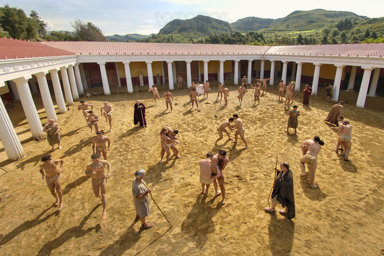 Morning training session for thirty athletes of all different sports chosen from six European countries (Germany, France-Switzerland, Greece, Italy and Spain).  For ten days, in the courtyard of this ancient palestra rebuilt as in Antiquity for the occasion, athletes, trainers, judges and archaeologists experienced how their ancestors lived 2500 years ago.