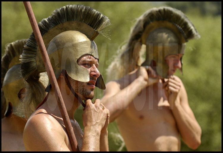 The French team trains for the armed race (hoplites) which will close the Olympic games.  Xavier Iacovelli, left, and Guillaume Barras, right, wear helmets, mandatory to participate in this race.