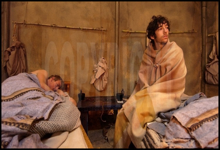 Not far from the palestra, participants stayed in a camp which identically recreated their ancestor’s living conditions.  Inside their tent, French athletes wake up after a cold night. Guillaume Barras, left, Christophe Chairiguet, right.