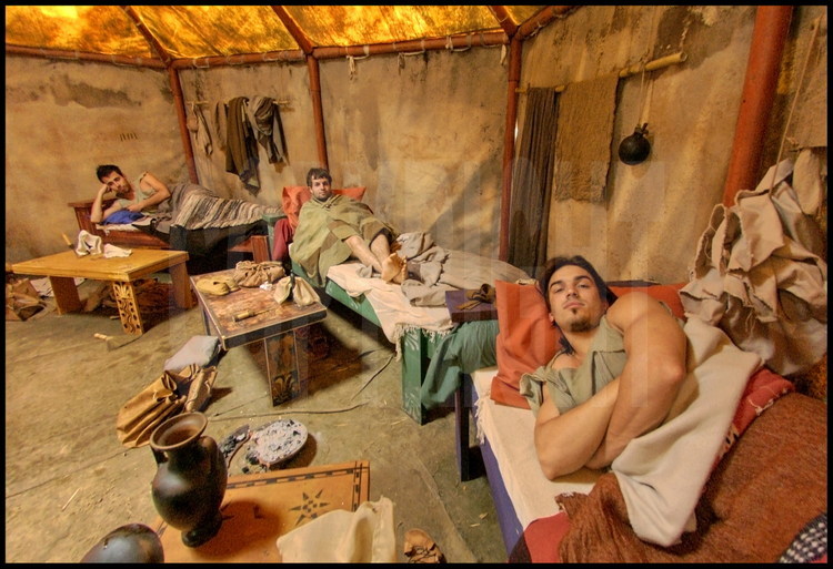 Not far from the palestra, participants stayed in a camp which identically recreated their ancestor’s living conditions.  Inside their tent, Italian athletes wake up after a cold night.  On the right, Emmanuelle Formichetti.