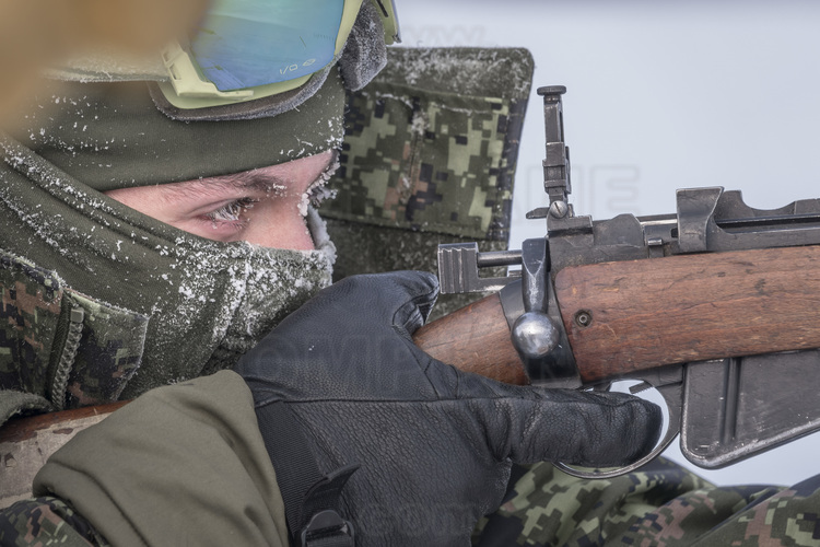 Canada - State of Nunavut - Operation NUNALIVUT 2018 - Surroundings of Cambridge Bay - Shooting Training Camp. The military trains with unsophisticated weapons, whose main quality is reliability at very low temperatures. These rifles are also intended to protect themselves from predatory animals (polar bears). Here, Corporal Myki Poirier-Joyal.